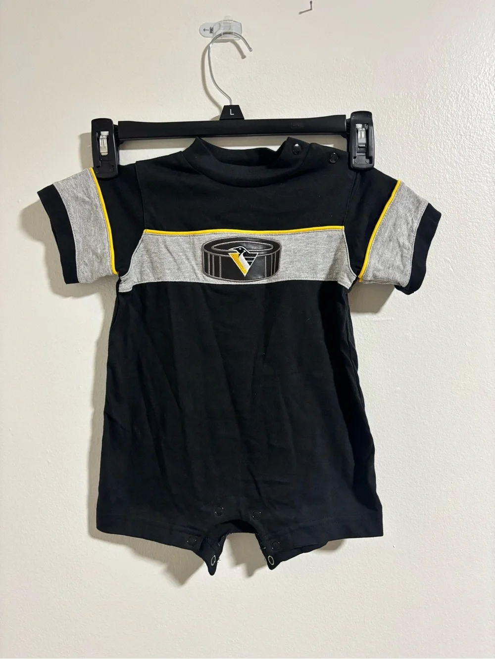 NHL Black One-Piece Romper with Gray Panels and Yellow Piping